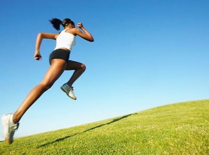 Susan running up a hill